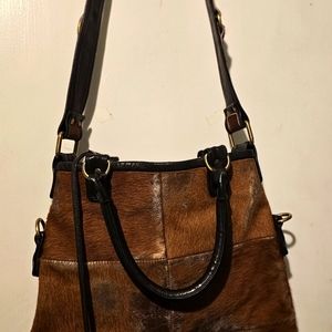 An original Oztau cowhide purse